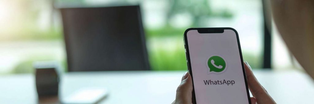 person using whatsapp integration at desk