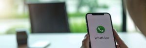 person using whatsapp integration at desk