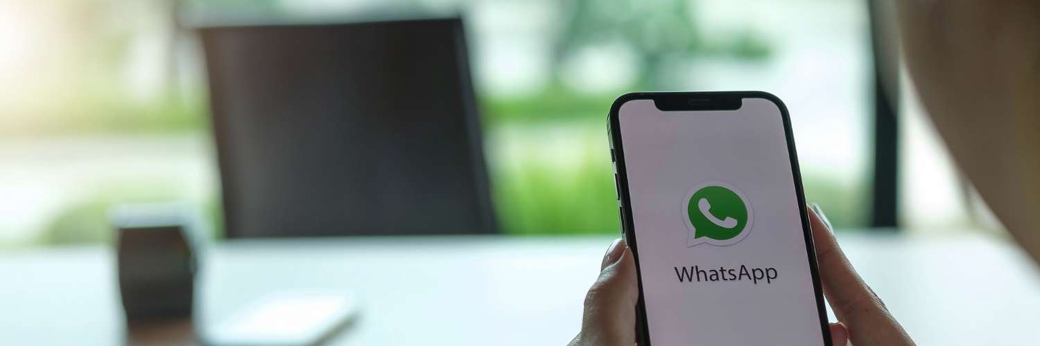 person using whatsapp integration at desk